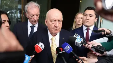 Indecent Assault Charges Involving Prominent Australian Media Personality Lessened